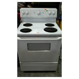 GE four burner electric stove, white color with