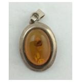.925 Sterling Amber 1 1/8" long pendant fits up