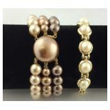 Two faux Pearl Bracelets, the 3 strand is marked