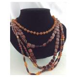 Three Brown/Amber Necklaces, different lengths