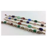 Four Multi-stone bracelets, one is missing stones
