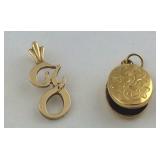 Two pieces of 14k gold:  Initial pendant and