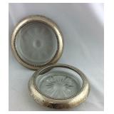 Two sterling rimmed glass coasters