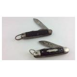 Two pocket knives, one is marked kamp king, some