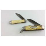 Two pocket knives one is marked lamp king,