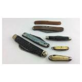 Six pocket knives, all have some damage