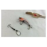 Fishing lures and lure tie clip