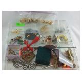 Flat of costume jewelry, hair pins, necklaces,