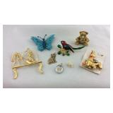 Eight pins/brooches, animal figures
