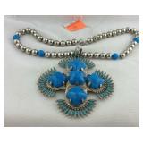 Castlecuff blue and silver tone necklace