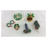 Five Christmas time brooches and one set of