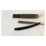 Celebrated razor, straight razor with box, rust