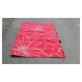 Small red and white home decor rug, measures 74