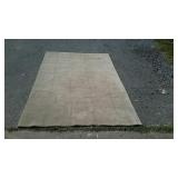 Tan area rug with square pattern does need to be