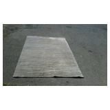 Multi colored tan wool area rug, does need to be