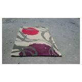 Wool multi colored area rug, does need to be