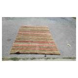 Indian style wool area rug, measures 96 inches