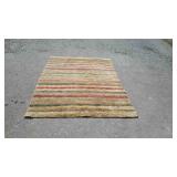 Indian style wool area rug, measures 97 inches
