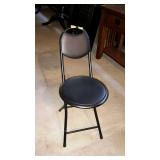 Small metal framed chair.