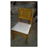 Single padded side chair. Slat back and n