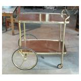 Mid-century tea cart. Brass finish with Formica