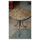 Metal framed, stone top table. 24" diameter and