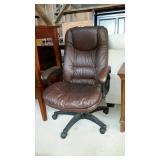 Brown vinyl office chair - Top right back torn,