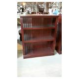 Three shelf bookcase, dark finish with a
