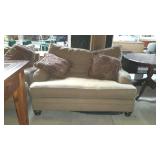 Single cushion love seat with two square throw