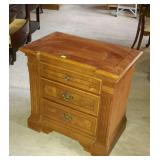 Three drawer end table measures 28x16x27