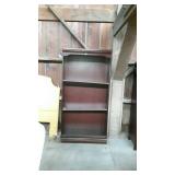 Bookshelf has four shelves measures 36x12x72