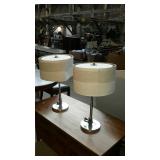 Pair of decor table lamps one shade has a little