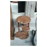 2-tier accent table with three rotating plant
