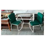 Wrought iron patio cafe table and two chairs.