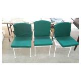 Three wrought iron chairs. One captain and two