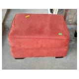Red upholstered ottoman