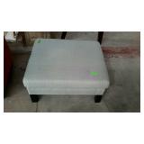 Blue upholstered ottoman