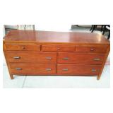 Wooden three over four drawer dresser, measures
