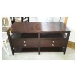 Flat screen stand. Has drawers and component