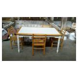 Dinning room table with four rush bottom chairs,