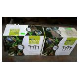 Solar spot lights - Two 4-pack boxes, appear to