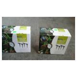Solar spot lights - Two 4-pack boxes, appear to