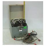 45 rpm record box full of audio cables