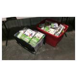 Two totes full of wall art for kids themes such