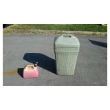Trash can with gas can