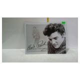 Elvis "The Sun Never Sets on a Legend" tin sign