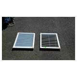 Two metal vent covers
