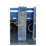 Two miss matched green shutters the smaller piece