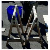 Two wooden saw horses