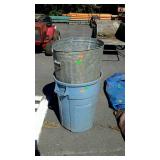 Group of two trash cans, one is metal one is